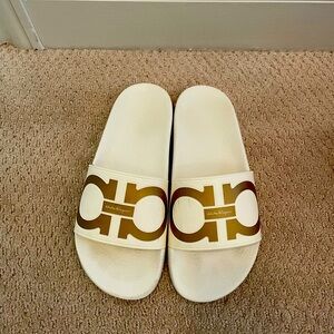 White and gold Salvatore Ferragamo pool slides